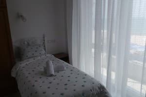 Мини-отель Guest House Mykonos. Двухместный Делюкс с двумя раздельными кроватями и видом на море 1
